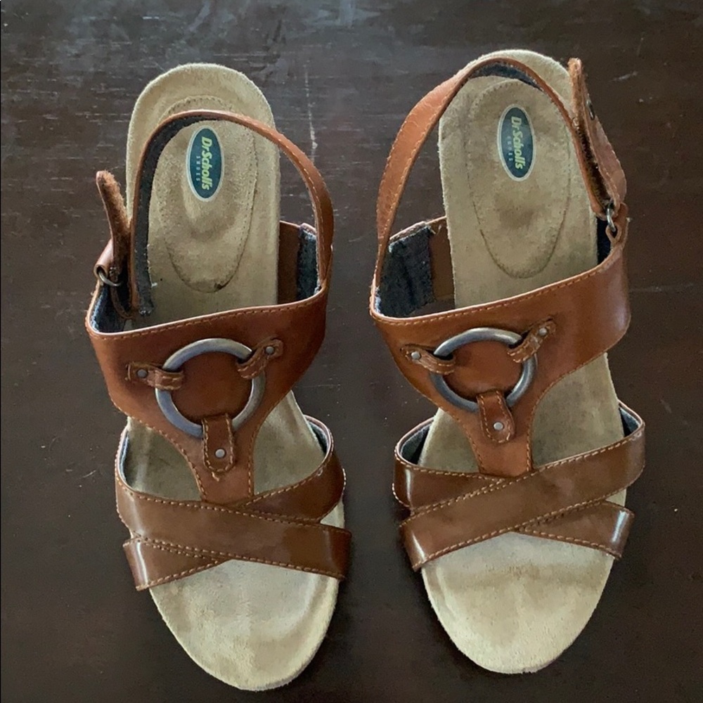 Stylish and comfy Dr. Scholl’s tan wedge sandals.